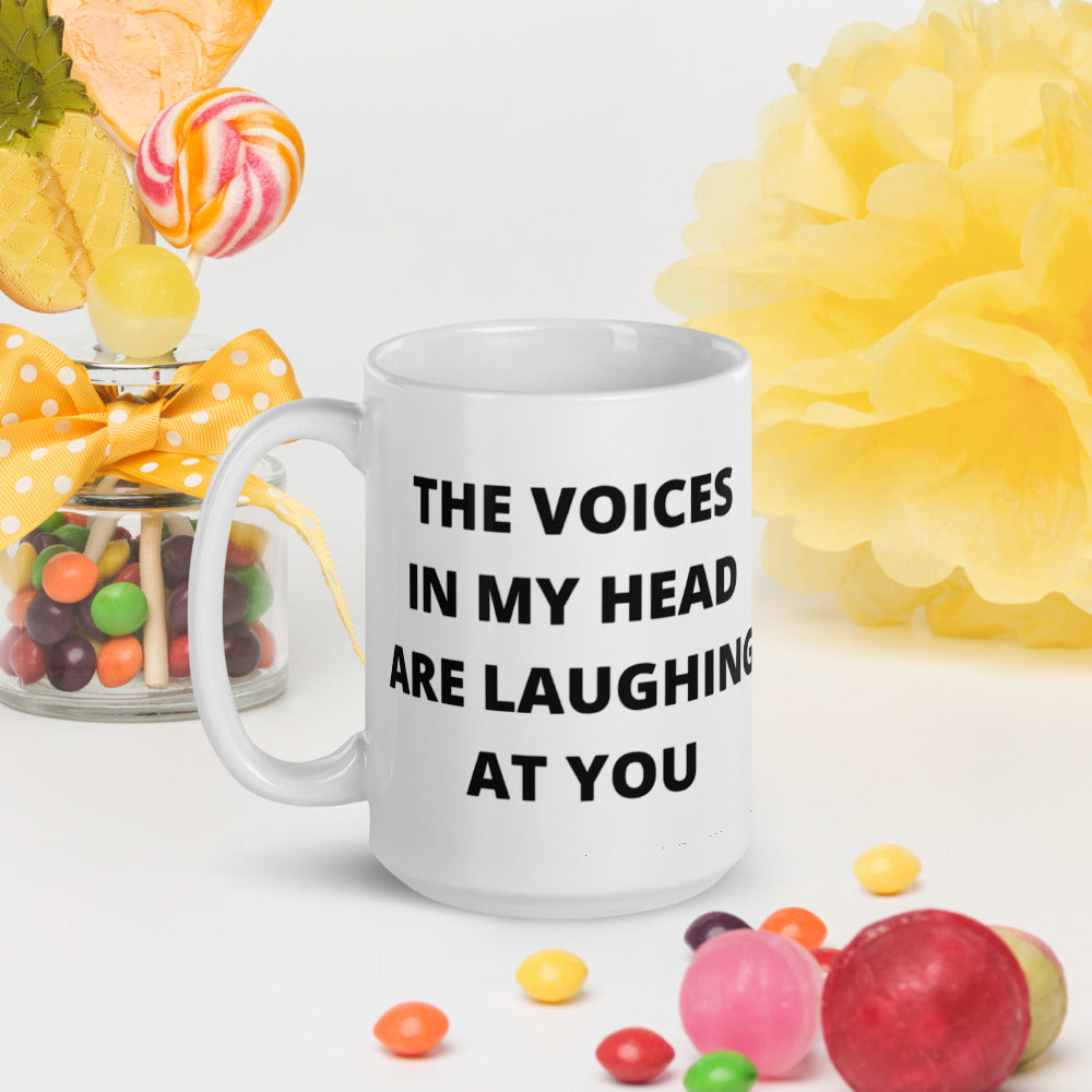 THE VOICES IN MY HEAD ARE LAUGHING AT YOU- White glossy mug